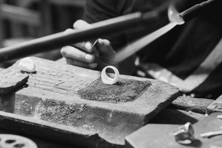 Ring being intricately handcrafted by a master silversmith